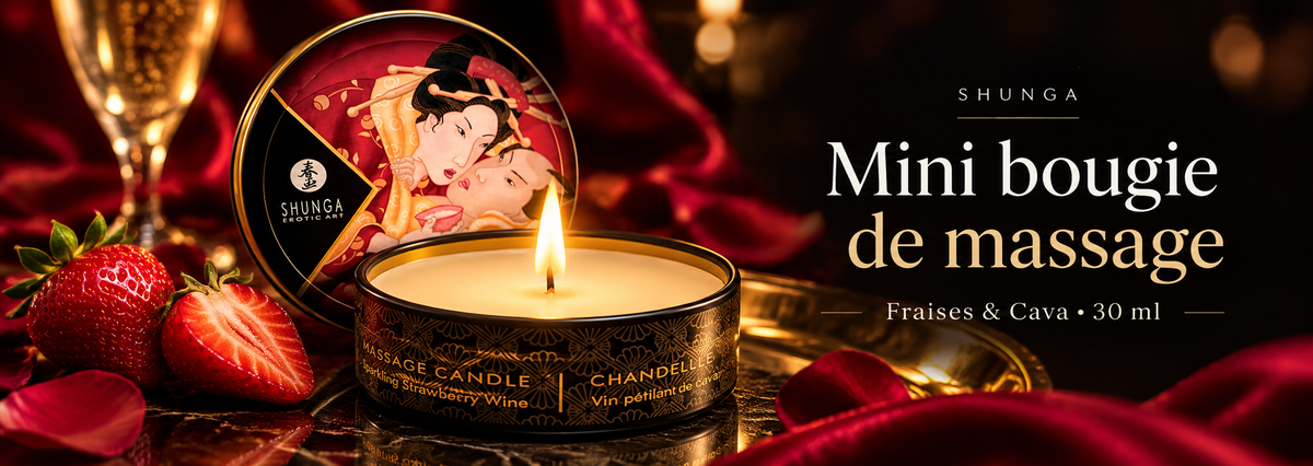 Bougie de massage Shunga Fraises & Cava 30 ml, présentée dans une ambiance sensuelle rouge et dorée avec fraises, pétales et coupe de cava.