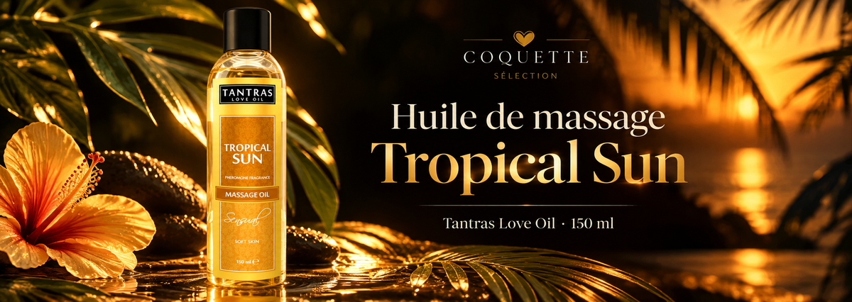 Bannière de l’huile de massage Tropical Sun Tantras Love Oil 150 ml – Intimateline, avec flacon doré, fleur d’hibiscus et feuillage tropical sur fond noir aux reflets dorés.