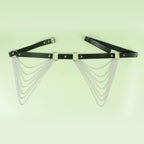 Ceinture chaîne noire Subblime présentée à plat avec chaînes argentées