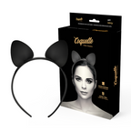 Serre-tête noir à oreilles de chat pointues en cuir végan devant son emballage Coquette Chic Desire